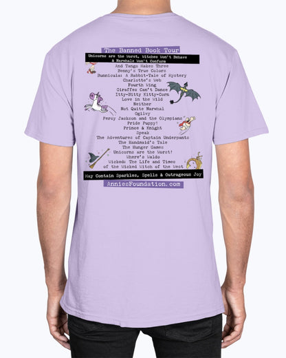 Annie’s Foundation ‘We Read Banned Books’ design on orchid t-shirt; whimsical art inspired by beloved banned books.